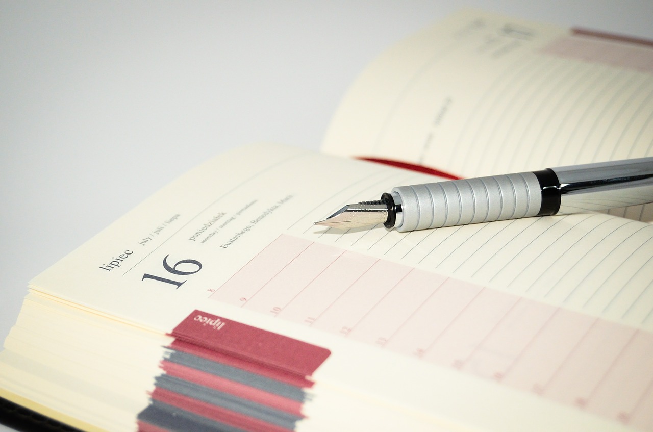 Pen and Notebook Writing Calendar